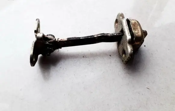 Rear door check strap stopper