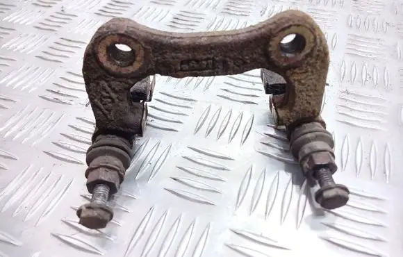 Renault Megane II Brake caliper pad carrier rear 