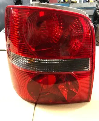 Volkswagen Touran I Rear/tail lights 1T0945095