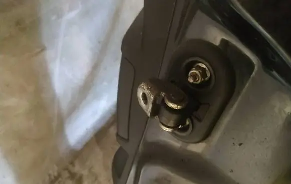 Rear door check strap stopper