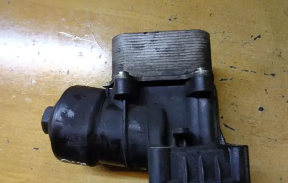 Skoda Yeti (5L) Oil filter mounting bracket 70346682 03L117201C