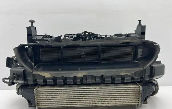 Radiator support slam panel