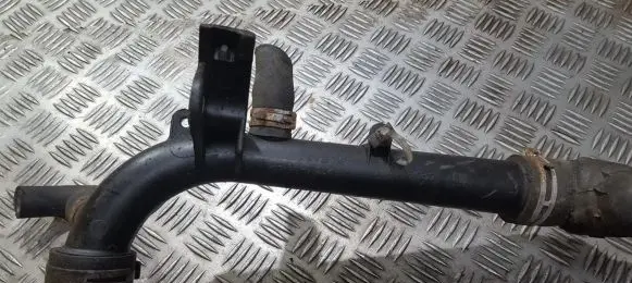Opel Tigra A Engine coolant pipe/hose 1310327