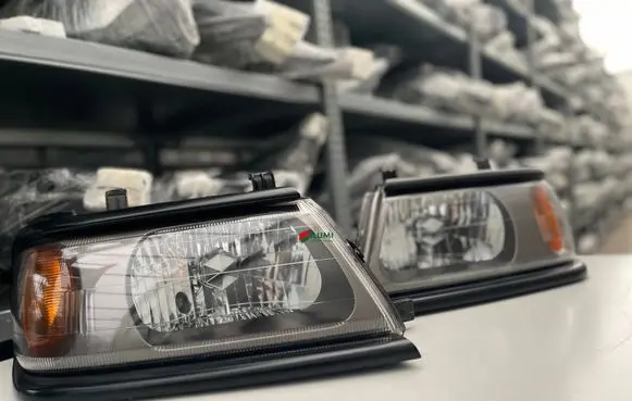 Mitsubishi Pajero Sport I Headlights/headlamps set 3248963 3248964