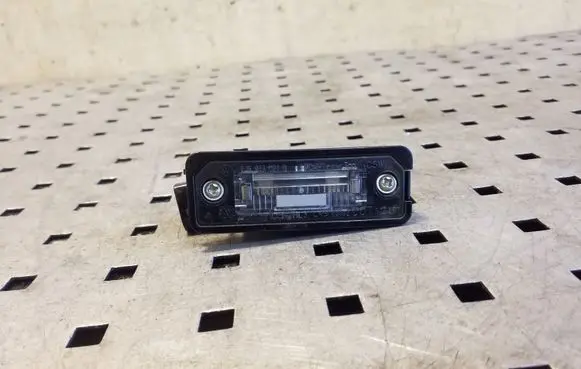 Volkswagen Eos Number plate light 1J6943021B