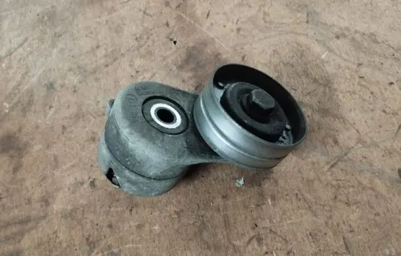 Chrysler Voyager Generator/alternator belt tensioner 04861630AB
