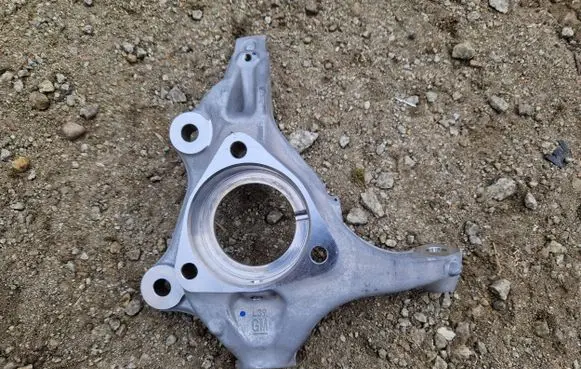 Opel Insignia B Front wheel hub spindle knuckle 23384197