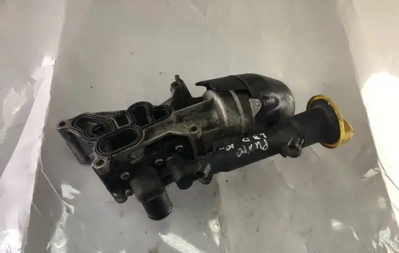 Fiat Punto Evo Oil filter mounting bracket 55210687