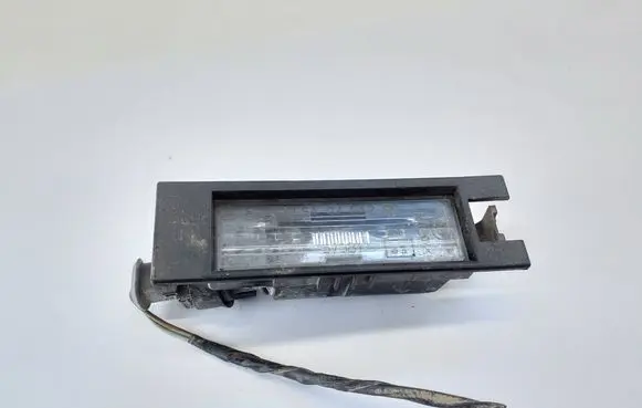Opel Astra H Number plate light 0461200