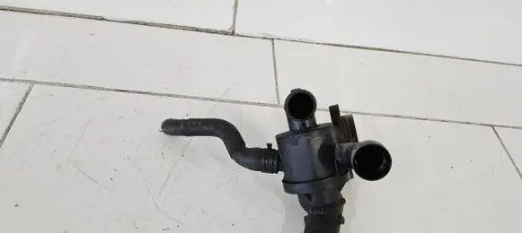 Thermostat/thermostat housing
