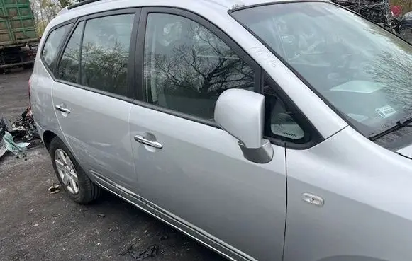 KIA Carens I Front door 