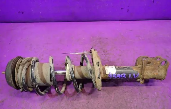 Opel Tigra B Front shock absorber with coil spring 