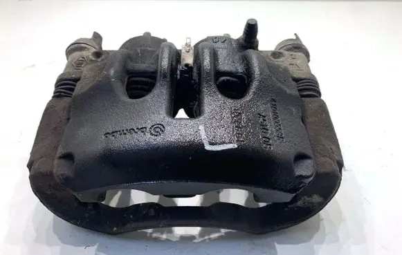 Opel Movano B Front brake caliper 410100559R