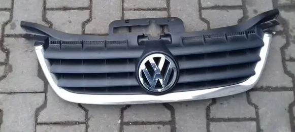 Volkswagen Touran I Front bumper upper radiator grill 1T0853651