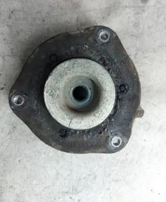 Volkswagen Touran I Coil spring mount 1K0412331C