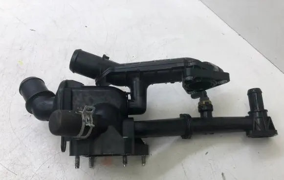 Thermostat/thermostat housing