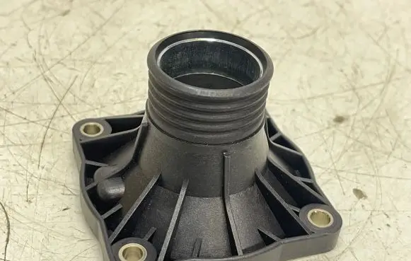 Thermostat/thermostat housing