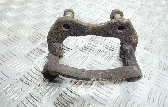 Nissan Primera Front Brake Caliper Pad/Carrier 