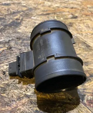 Opel Zafira B Mass air flow meter 55561301 0281002832