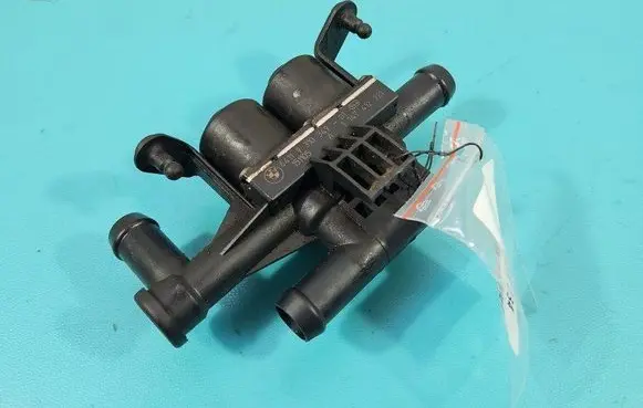 Coolant heater control valve