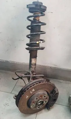 Volkswagen PASSAT B7 Front shock absorber with coil spring