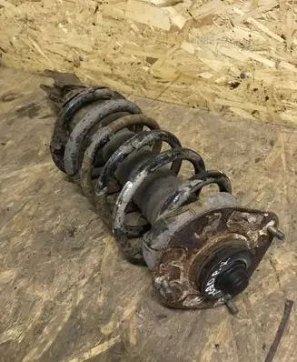 Volvo XC90 Front shock absorber with coil spring