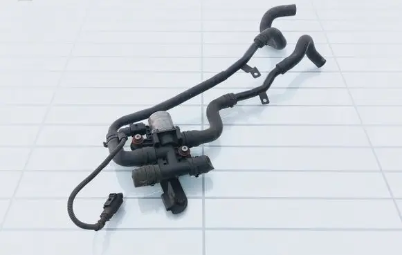 Coolant heater control valve