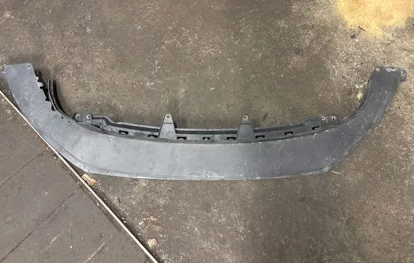 Volkswagen Touran I Front bumper lip 1K9805915A