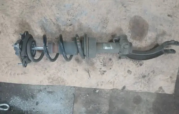 Audi A7 S7 4G Front shock absorber with coil spring 4G8031F