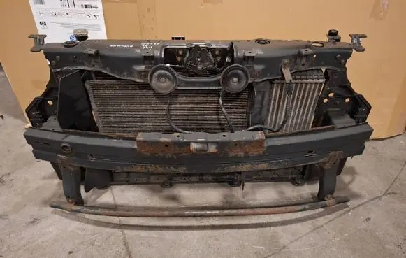 Radiator support slam panel