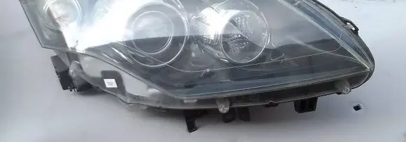Renault Laguna III Headlight/headlamp 260100043R A048319 89902279