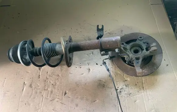 Dacia Sandero Front shock absorber with coil spring 543023022R