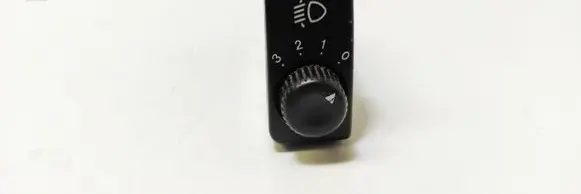 KIA Clarus Headlight level height control switch