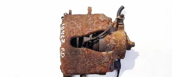 Opel Astra G Front brake caliper 