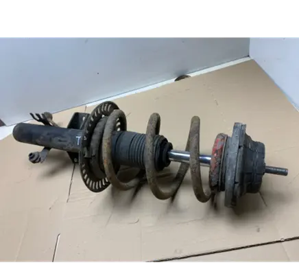 Front shock absorber with coil spring