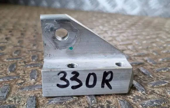 Radiator support slam panel bracket