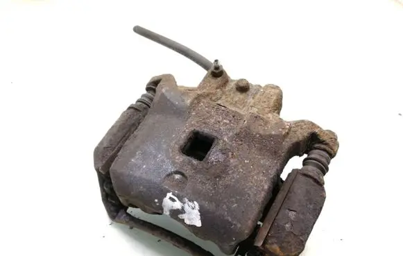 Nissan Juke I F15 Front brake caliper