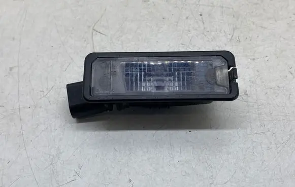 Volkswagen Caddy Number plate light 1K8943021