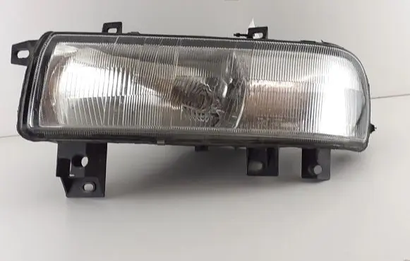 Nissan Interstar Headlight/headlamp 7700352103F