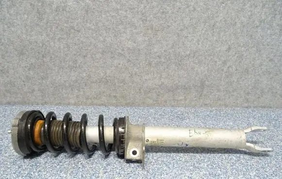 Front shock absorber with coil spring