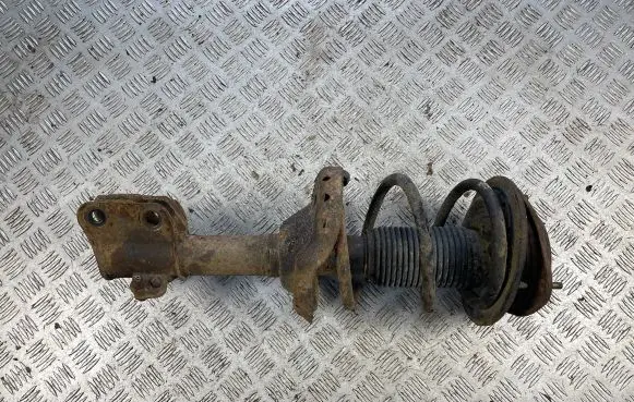 Subaru Legacy Front shock absorber with coil spring