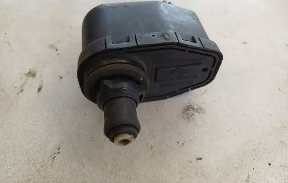Volkswagen Golf II Headlight level adjustment motor 321941295