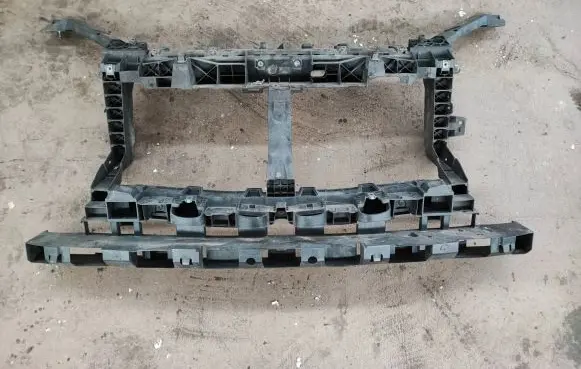 Radiator support slam panel