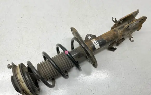 Nissan Pulsar Front shock absorber with coil spring