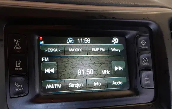 Jeep Grand Cherokee Radio/CD/DVD/GPS head unit P68237070AC