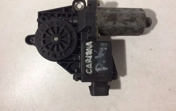 Mitsubishi Carisma Front door window regulator motor 0130821652