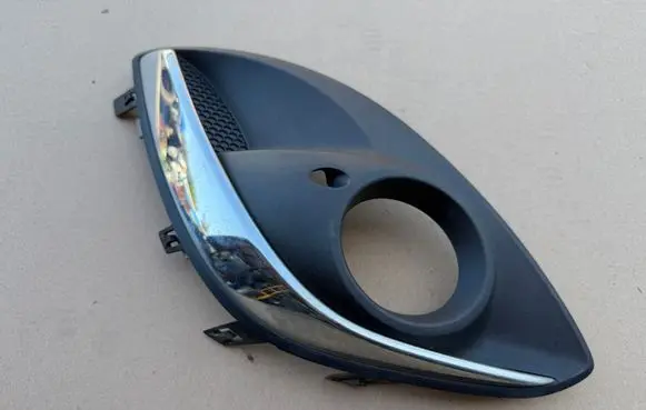 Opel Corsa D Front fog light trim/grill 13286026