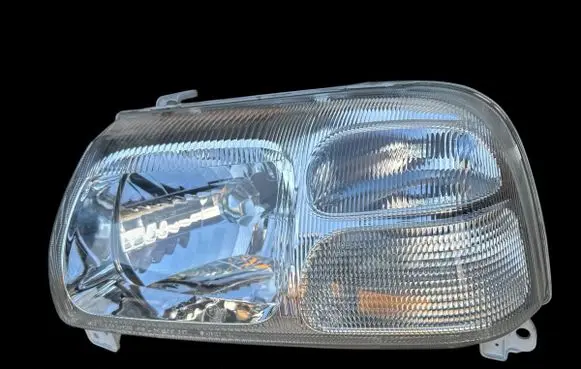 Suzuki Grand Vitara I Headlight/headlamp 10032080