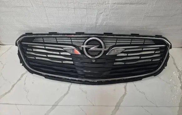 Opel Insignia B Front bumper upper radiator grill 13491199 55100454