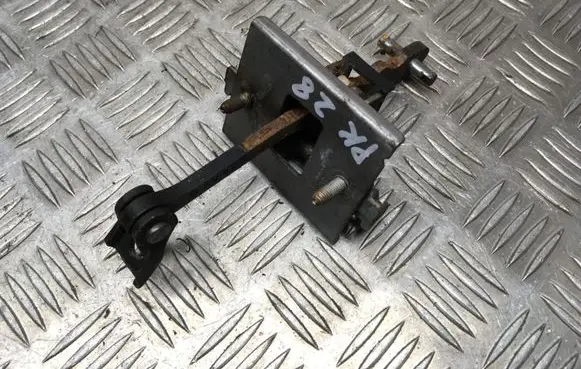 Front door check strap stopper